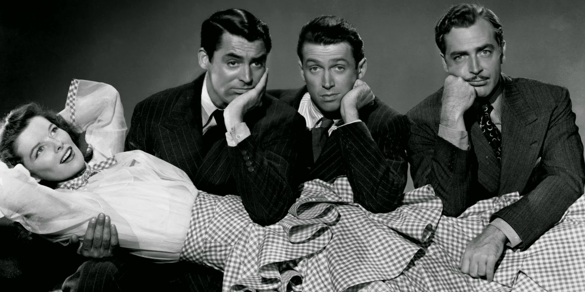 Katharine Hepburn, Cary Grant, James Stewart and John Howard in a publicity still for The Philadelphia Story.